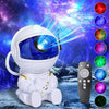 Luz nocturna futurista blanca con visor azul y control remoto contra un fondo de espacio estrellado.