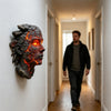 A cracked soul resin wall light pendant mounted on a white wall in a hallway.