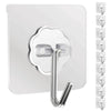 Silver heavy duty adhesive hook with a decorative shape mounted on a white tile.