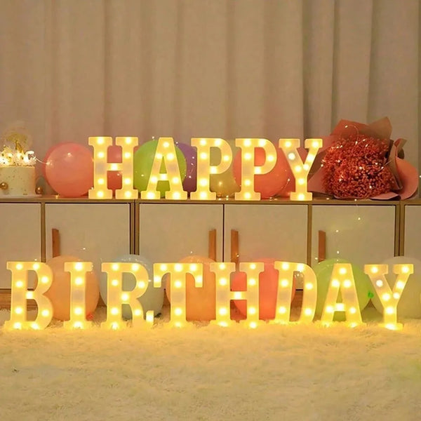 LED letter and number night lights spelling out HAPPY BIRTHDAY in various pastel colors