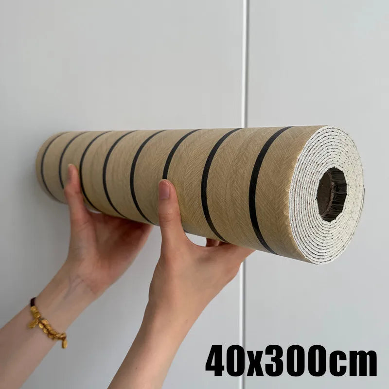 Roll of self-adhesive wood grain wall panels showing the texture and size