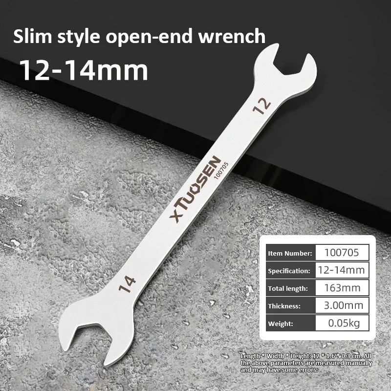 A silver slim style open-end wrench measuring 12-14mm, shown against a gray background.