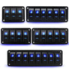 A collection of black rocker switch panels for automotive and off-road lighting, featuring multiple illuminated switches.