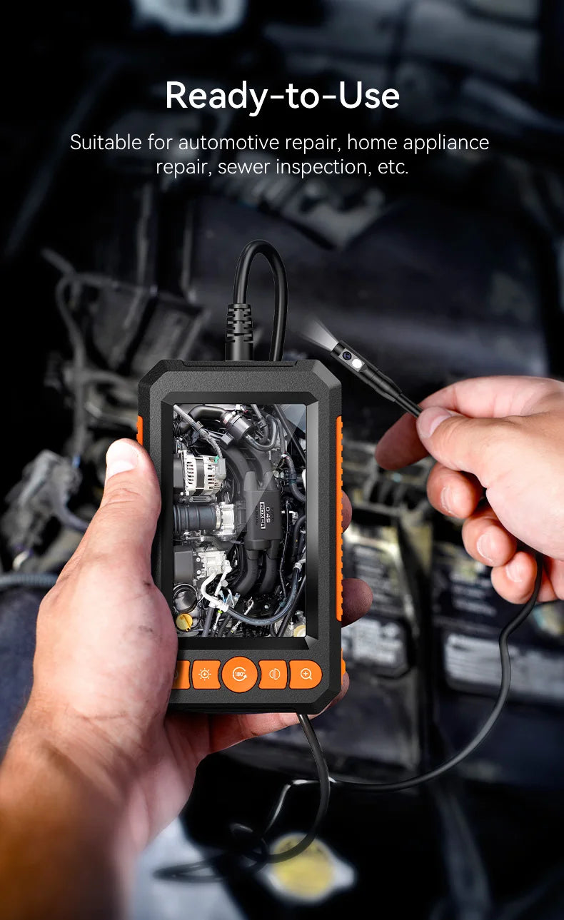 A hand holds an industrial waterproof borescope inspection camera displaying an internal view of an engine or appliance.