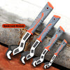 A set of orange and gray quick lock wrenches with serrated tips resting on a metal surface.