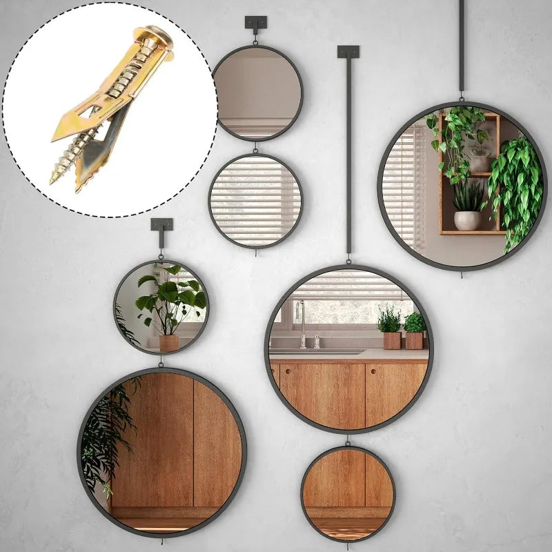 A collection of round mirrors and a yellow self-tapping drywall expansion anchors kit mounted on a white wall.