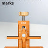 An Imbot scale tool with upper and lower double rows of scale marks, used for cabinet door installation.