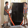 A man is using heavy duty furniture moving straps to secure a large black refrigerator during a move.