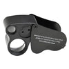 Black foldable LED magnifier for jewelry identifying type with a circular lens and magnification capabilities.
