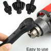 A black electric drill and ratchet key set with various bits shown next to a red tool.