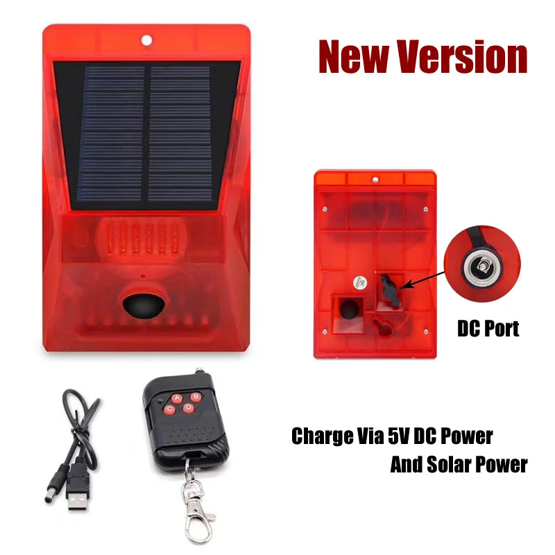 Red solar motion sensor security alarm device with a DC port and charging cable.
