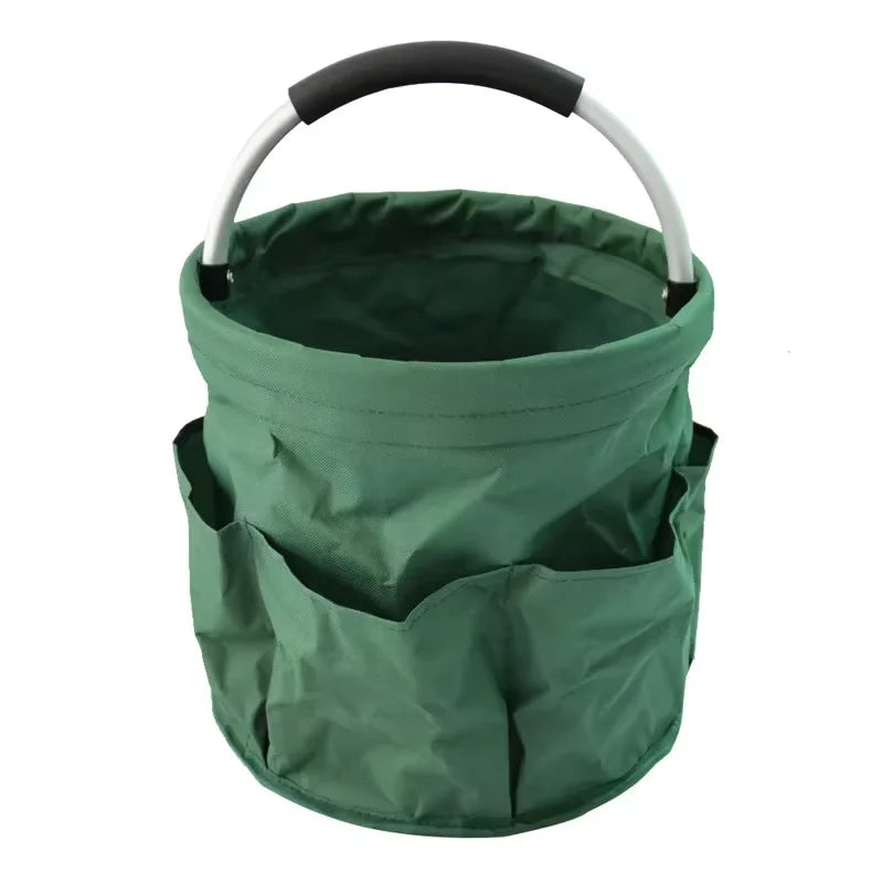 A large folding storage organizer basket in dark green fabric with a black handle.