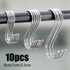 A set of three silver stainless steel hanging hooks with varying lengths mounted on a dark bar.