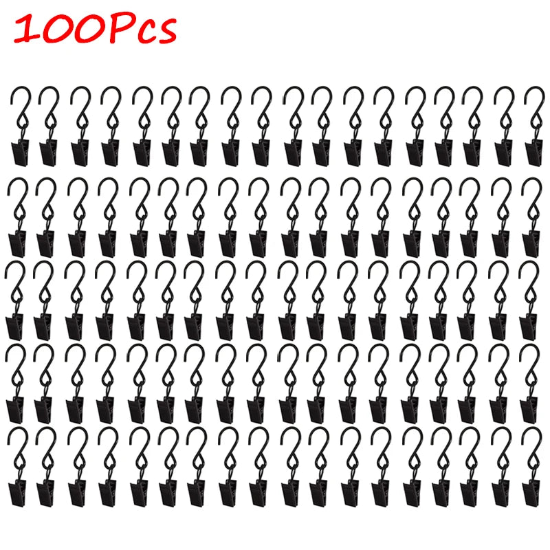 A grid of stainless steel curtain clips used for photo decor.