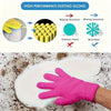 A hand wearing bright pink dusting gloves is shown cleaning white surface covered in dust.