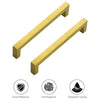 Two gold-toned stainless steel cabinet and drawer pulls shown against a white background.