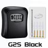 Black wall-mounted security key lock box with a metal key and various key blanks.
