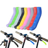 A row of colorful silicone brake lever protector covers for bicycles, showing various shades of pink, yellow, green, and blue