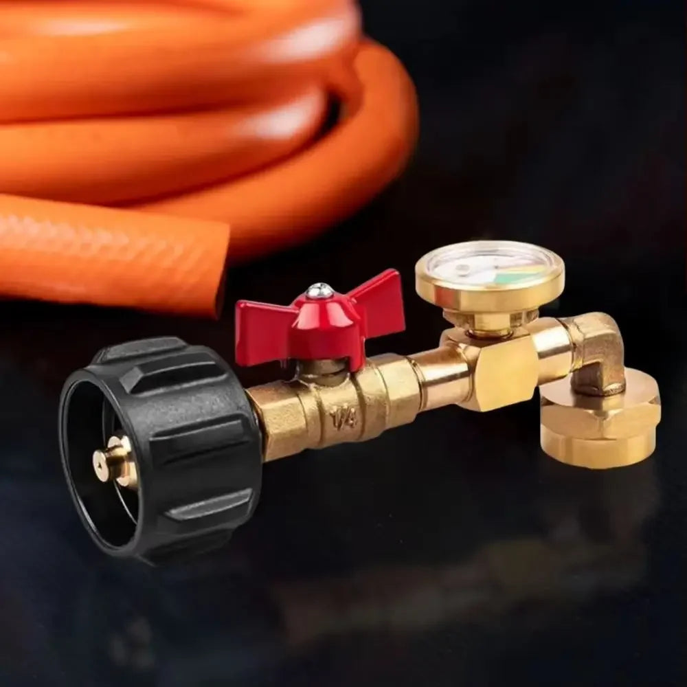 A brass gas tank connector adapter with a red valve and a clear gauge is shown against a dark background.