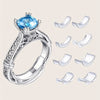 Silver ring sizer kit with a blue gemstone and multiple sizing tools for jewelry