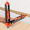 An orange precision contour gauge is held by a hand, demonstrating its use for profile duplication.