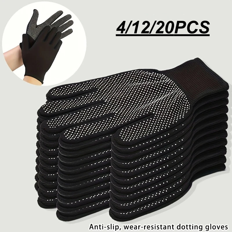Ein Stapel schwarzer rutschfester, abriebfester Dotting-Handschuhe mit einer Hand in der Inset.