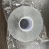 Roll of double-sided nano reusable adhesive tape packaged in clear plastic.