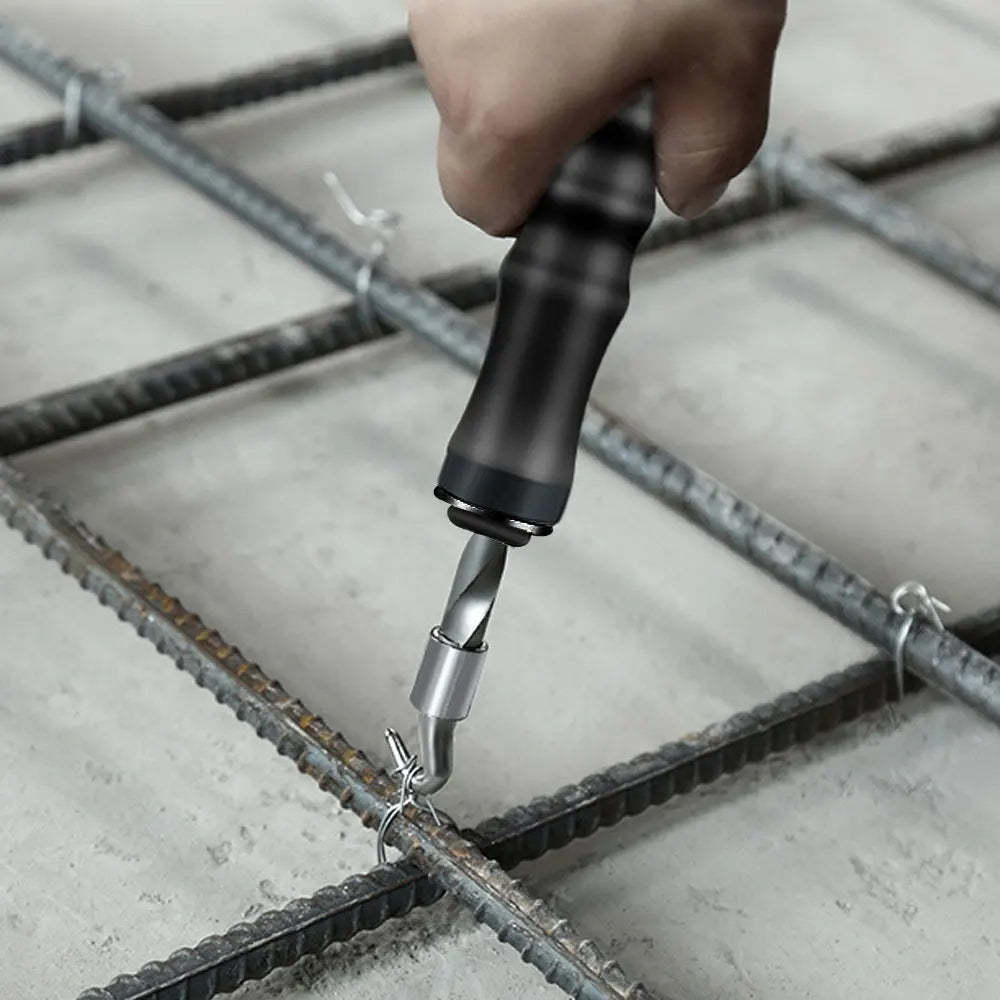 A hand is using an automatic rebar tie wire twister tool to bend and secure a piece of rebar.