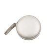 Silver retractable dual scale measuring tape with a leather strap.