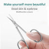 A hand holds a pair of stainless steel multifunction scissors used for dead skin and eyebrow grooming.