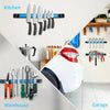 A display of heavy duty magnetic tool rack organizers and various hand tools mounted on a wall in a kitchen or garage setting