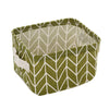 A square foldable linen storage basket in olive green fabric with a white chevron pattern.