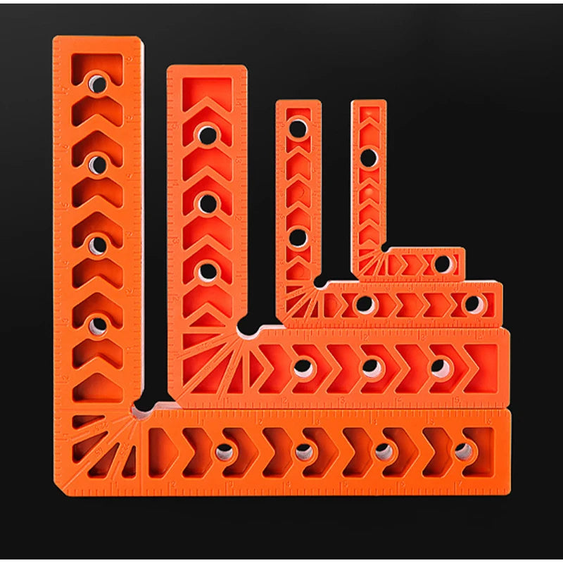 Orange plastic jig or positioner used for woodworking to mark 90-degree angles.