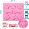 Set de moules en silicone roses aux formes de pattes et os de chien pour la création ou l'alimentation.