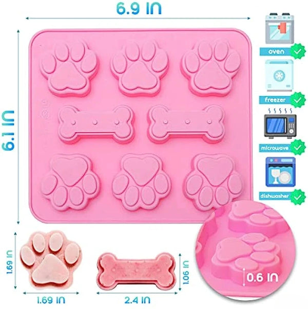 Rosa Silikon-Backform-Set mit verschiedenen Hundpfoten- und Knochenformen zum Basteln oder zum Kochen.