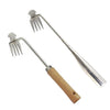 Stainless steel hand tool with a long handle and fork for deep root weed removal