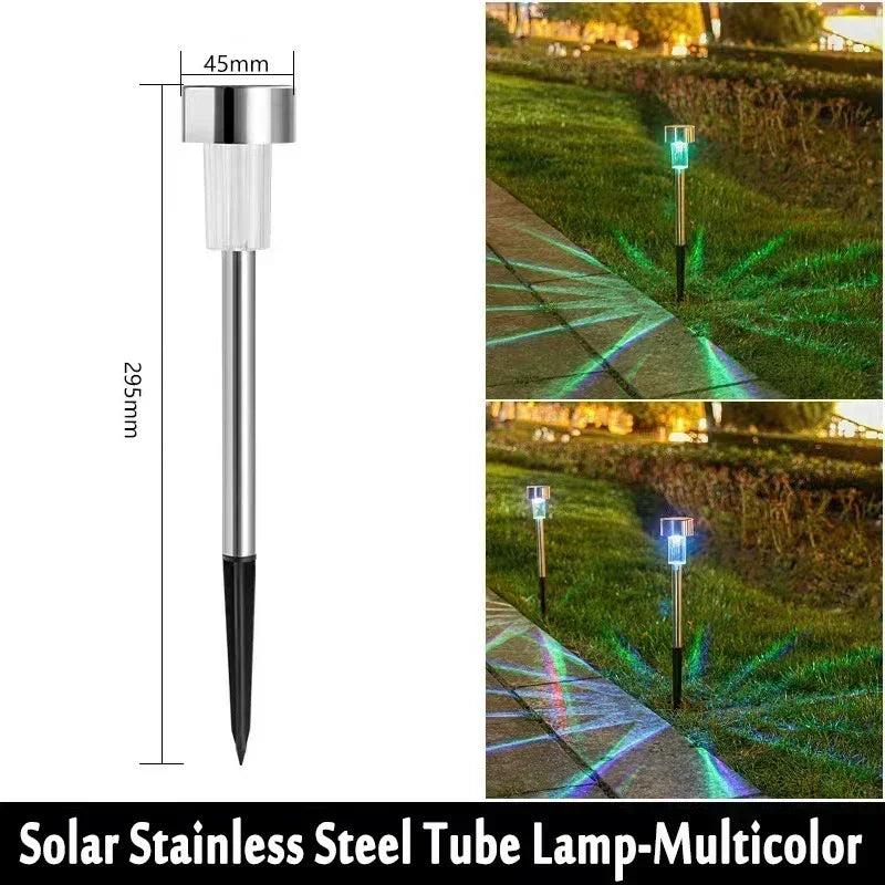 Solar stainless steel tube lamp multicolor outdoor pathway light illuminating a green garden path