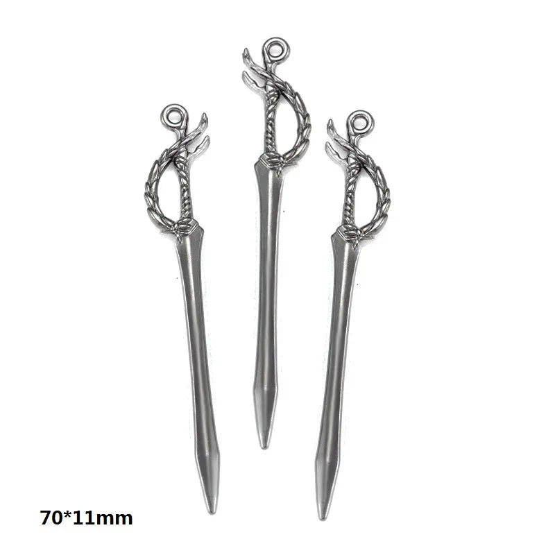 A pair of silver-colored alloy charms shaped like stylized branches or twigs for DIY jewelry making