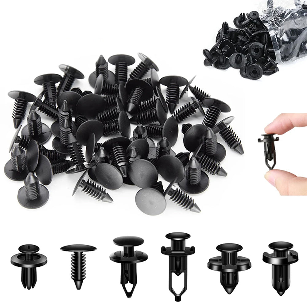 A collection of black car retainer clips and trim fasteners for automotive use.