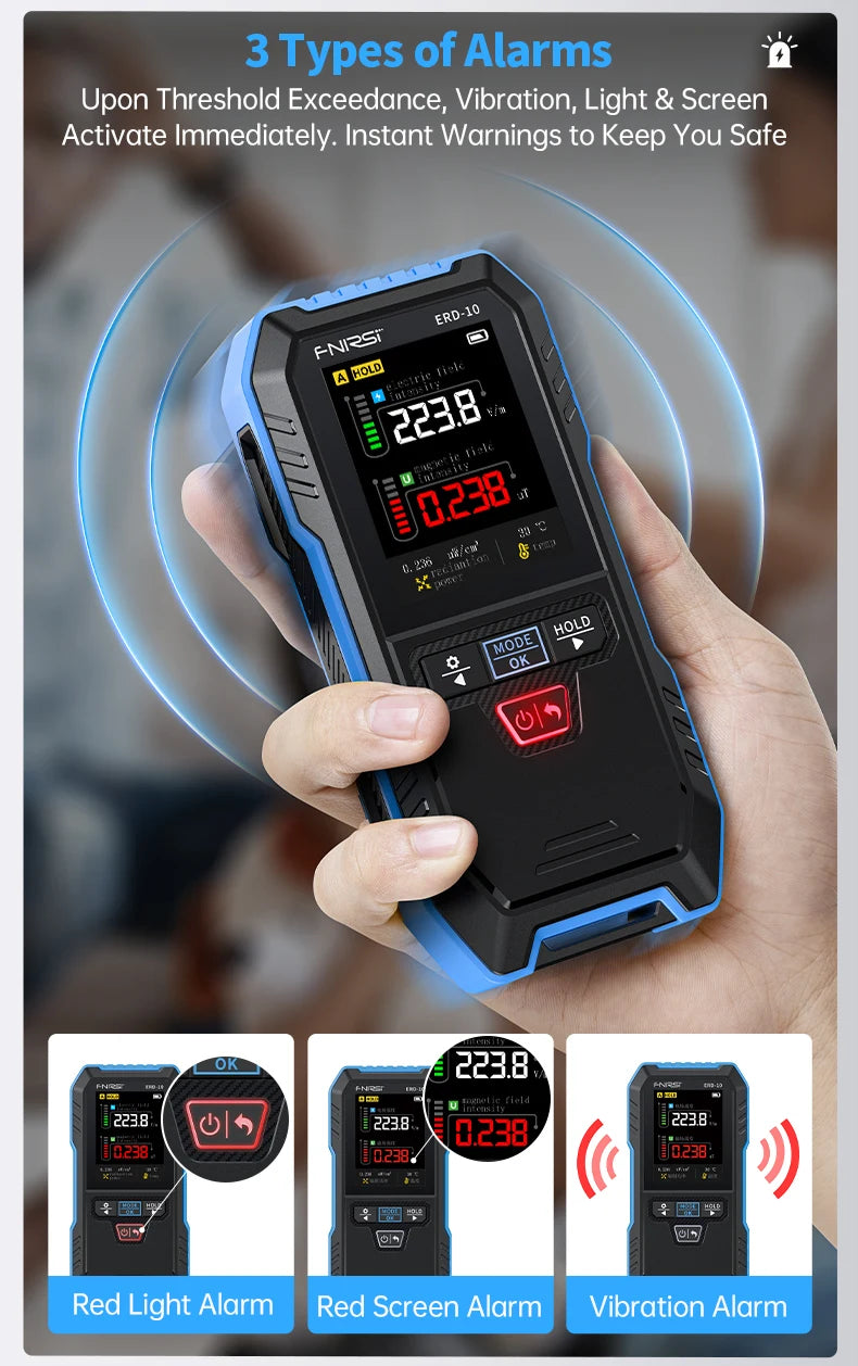 A hand holds a black and blue electronic alarm device displaying a reading of 223.8 and 0.238.