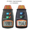 A black digital tachometer device labeled DT-2234C with a laser tachometer for measuring speed in RPM.