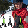 A person wearing red outdoor gear is holding a pair of green parachute rope work gloves.