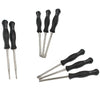A set of tools for carburetor adjustment, including various sized needles and tools.