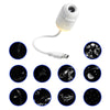 A white projector night light with a flexible cord and various star patterns displayed on a dark background.
