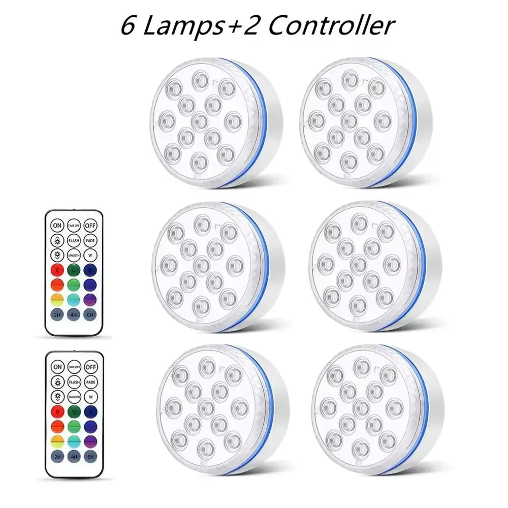 Six lumières LED sous-marines pour piscine et deux télécommandes.