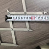 A precision tool used for finding a 3-point center, shown alongside a ruler.