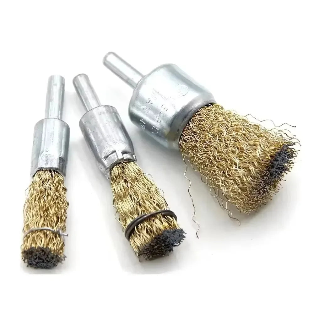 A set of precision wire brushes with metal handles and brass bristles for rust removal and polishing.