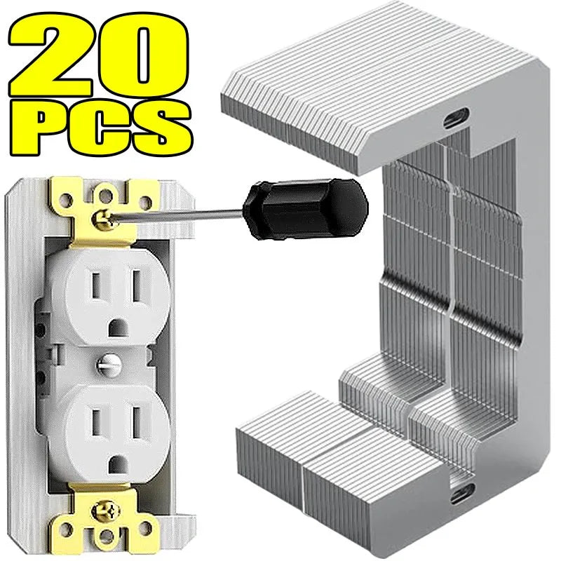 A silver flush mount outlet gasket with a black pin is shown next to a white wall plate component.