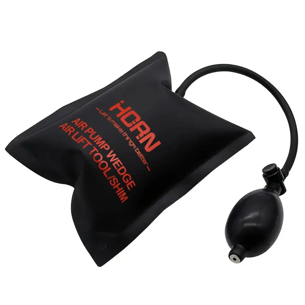 Black flexible door window air pump wedge tool for lifting and trimming.
