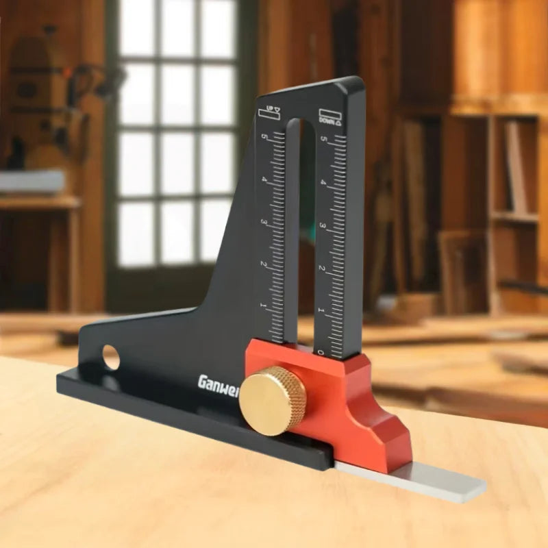 A black precision depth gauge with a brass adjustment knob rests on a wooden surface.